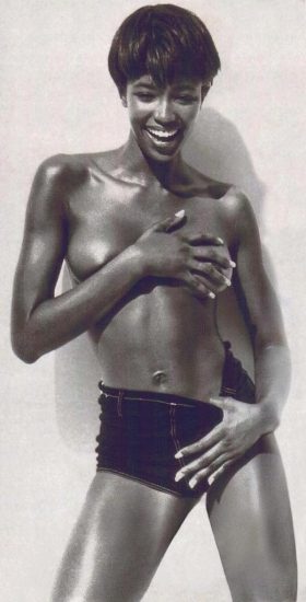 naomi campbell covering her boobs with hands