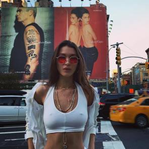 bella hadid nippless by her billboard ad in NYC